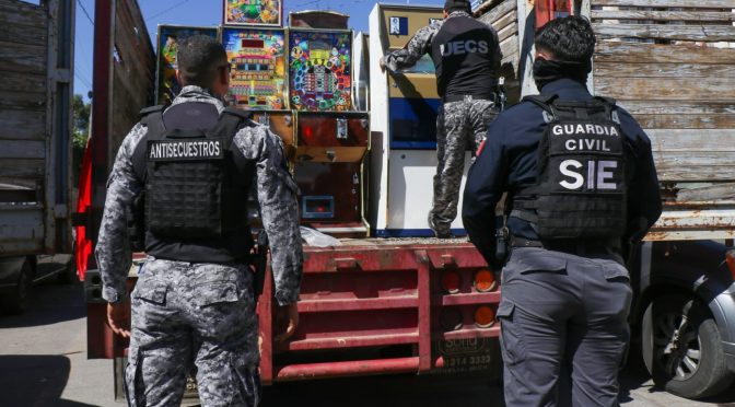 Autoridades federales y estatales aseguran 127 máquinas traga monedas en 8 cateos en Morelia